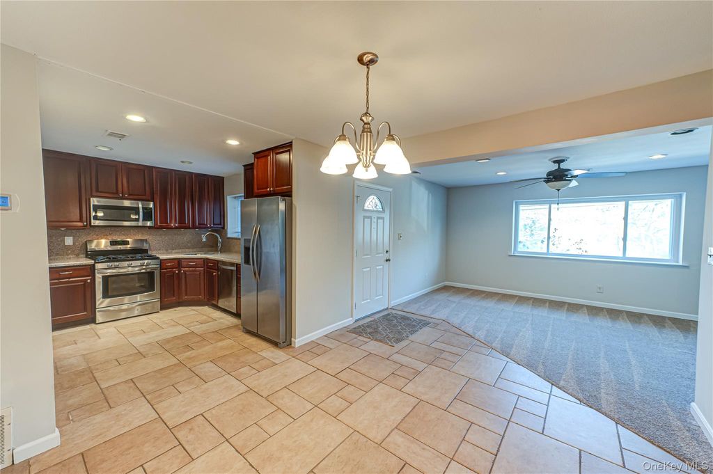 Photo of 213 Storm Drive #213, Holtsville, NY 11742 (MLS # 951442)