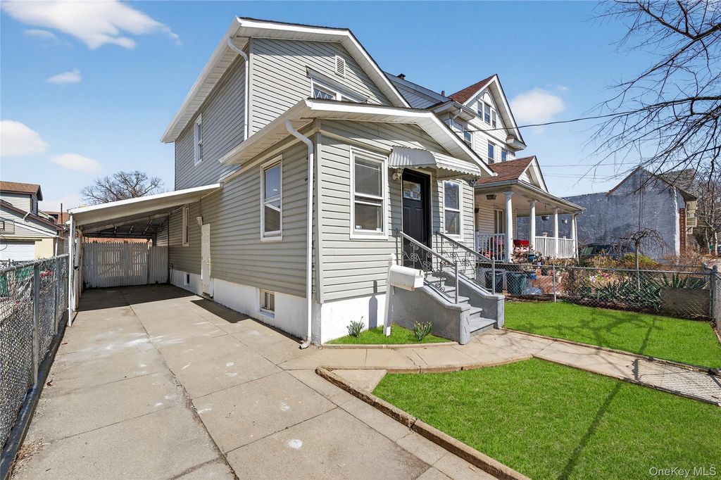 Photo of 172-09 140th Avenue, Jamaica, NY 11434 (MLS # 975637)