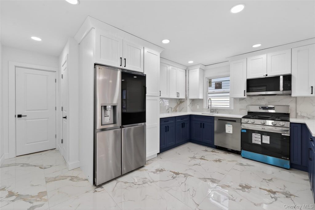 Photo of 172-09 140th Avenue, Jamaica, NY 11434 (MLS # 975637)