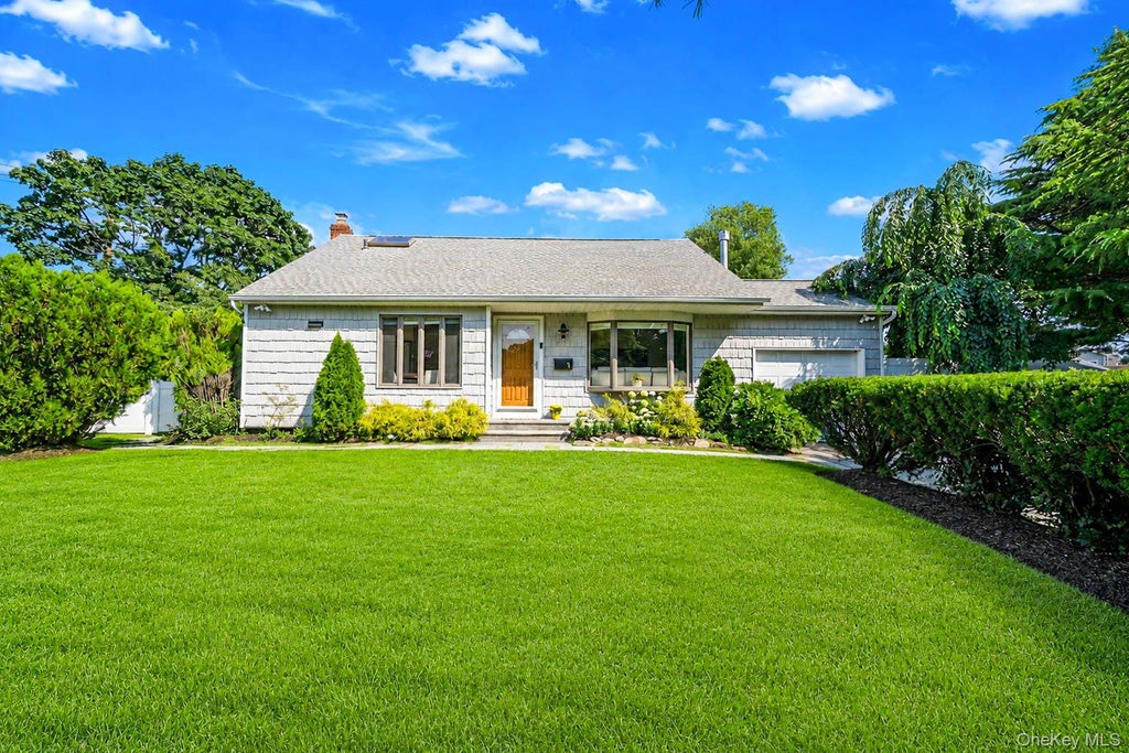 Photo of 1 Rutgers Street, Smithtown, NY 11787 (MLS # 1048457)