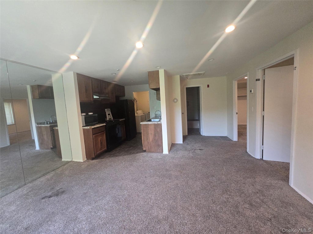 Photo of 84 Glen Hollow Drive, Port Jefferson, NY 11776 (MLS # 1044415)