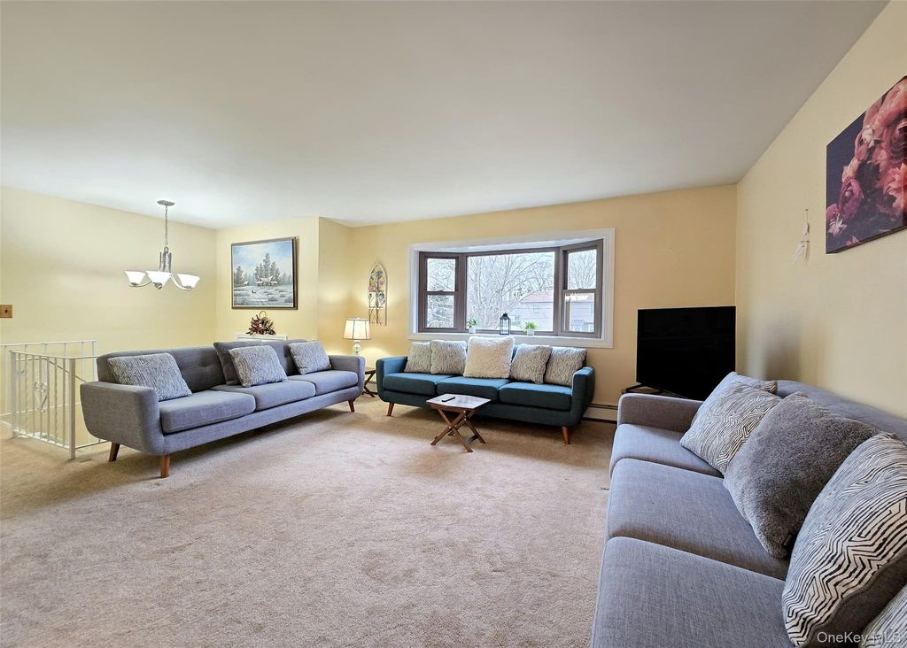 Photo of 207 N Evergreen Drive, Selden, NY 11784 (MLS # 942666)