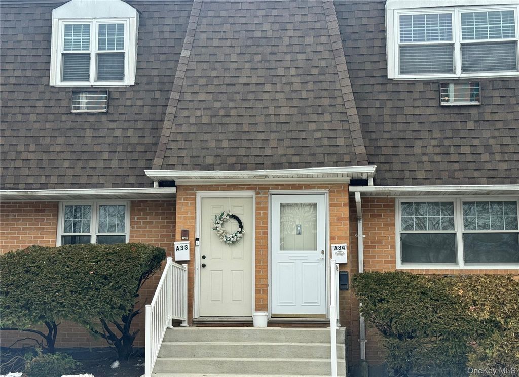 Photo of 6 Glen Hollow Dr #A33, Brookhaven, NY 11742 (MLS # 966454)