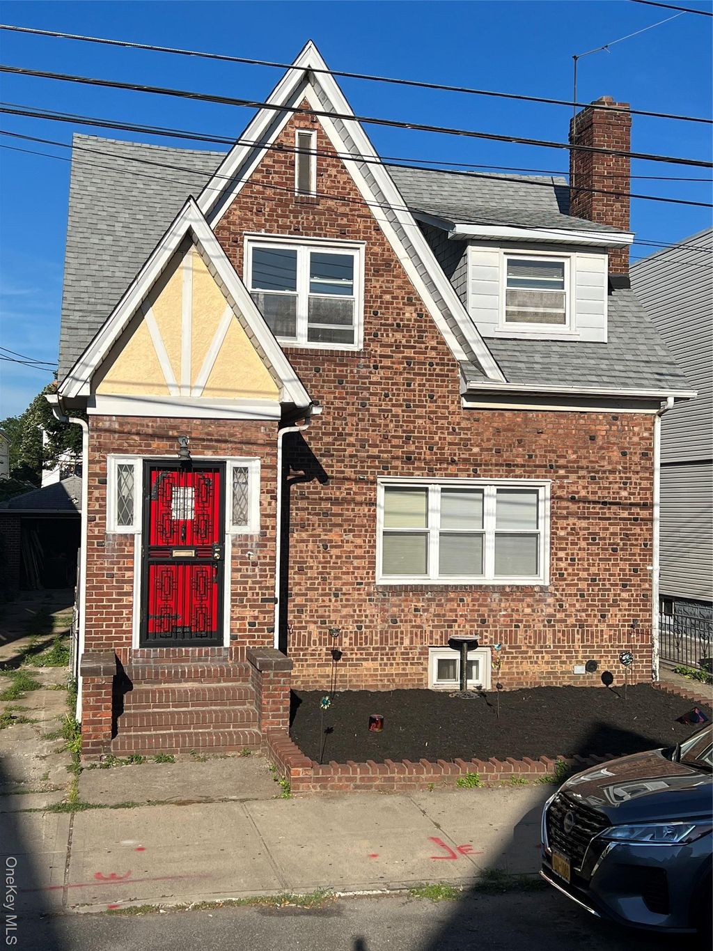 Photo of 104-40 114th Street, Jamaica, NY 11419 (MLS # 945884)