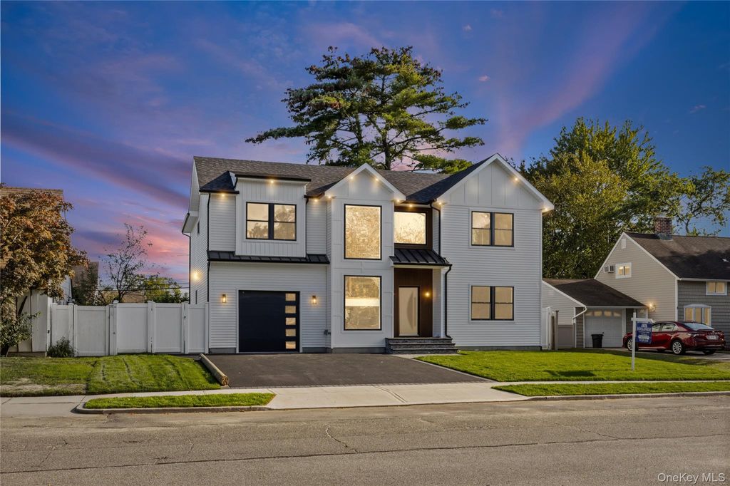 Photo of 10 Crown Lane, Westbury, NY 11590 (MLS # 918189)