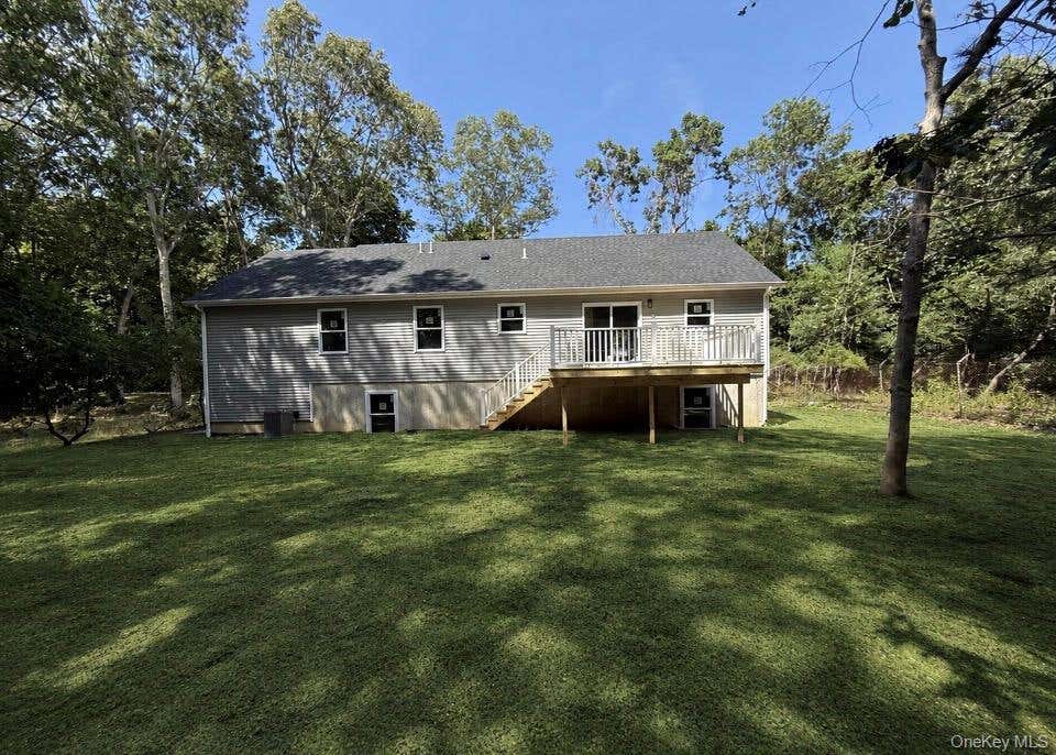Photo of 6 Scout Trail, Ridge, NY 11961 (MLS # 1036370)