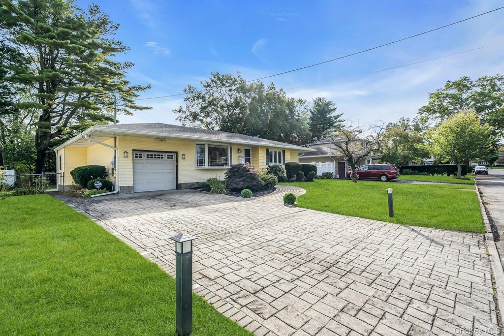 Photo of 10 Fruitwood Lane, Commack, NY 11725 (MLS # 1062514)
