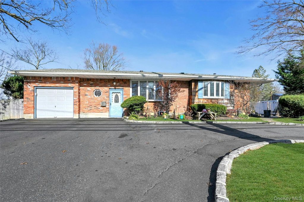 Photo of 133 Wolf Hill Road, Melville, NY 11747 (MLS # 942709)