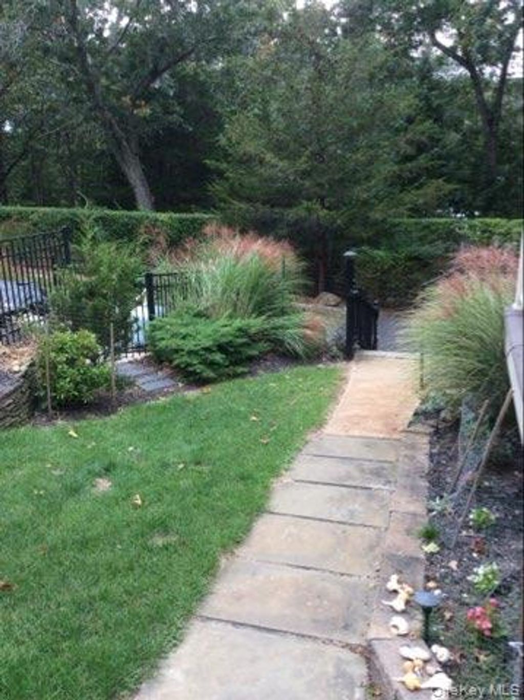 Photo of 41 Red Cedar Point Pt, Hampton Bays, NY 11946 (MLS # 961738)