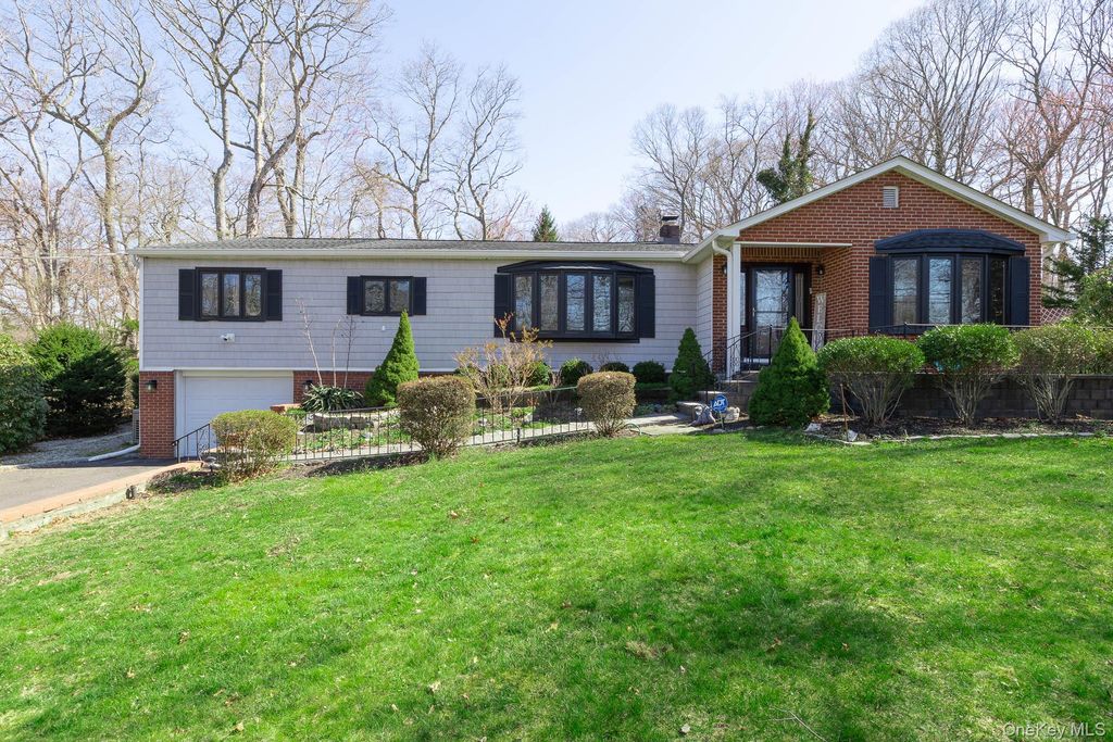 Photo of 323 Pipe Stave Hollow Road, Miller Place, NY 11764 (MLS # 987614)