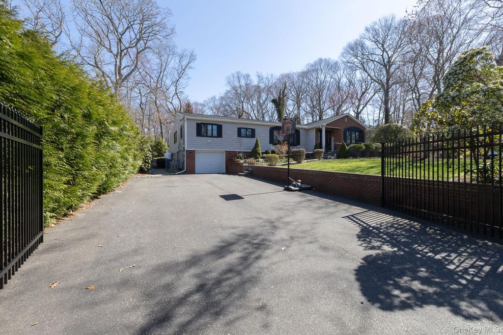 Photo of 323 Pipe Stave Hollow Road, Miller Place, NY 11764 (MLS # 987614)