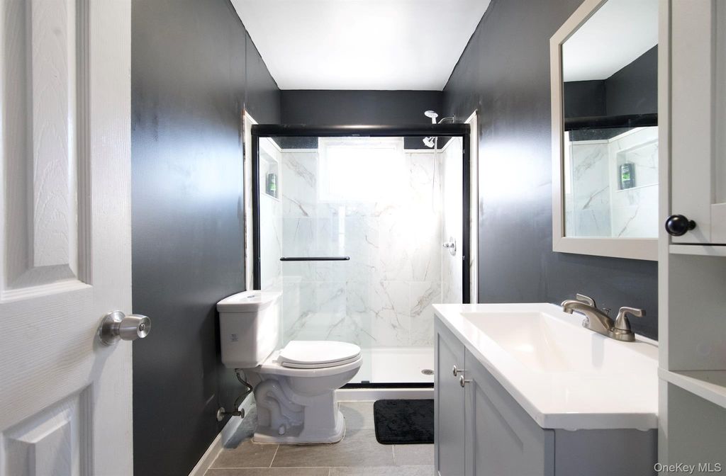 Photo of 64 Beech Avenue, Farmingville, NY 11738 (MLS # 974797)