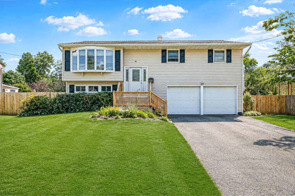 Photo of 104 Utica Street, Bay Shore, NY 11706 (MLS # 1037761)