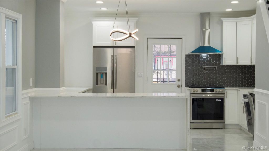 Photo of 11024 207th Street, Queens Village, NY 11429 (MLS # 961673)