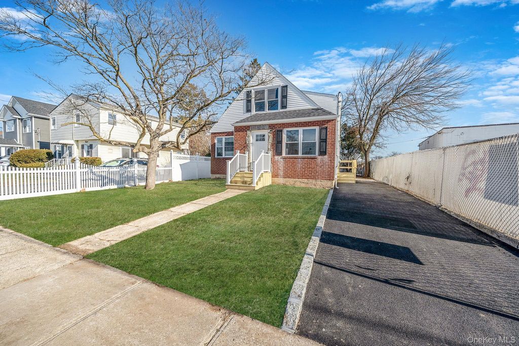 Photo of 8 Rockaway Avenue, Westbury, NY 11590 (MLS # 951941)