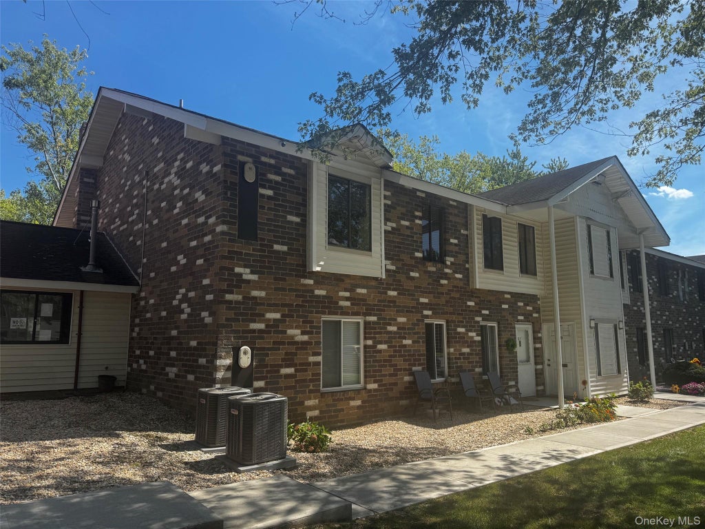 Photo of 8 Denver Court #8D, Coram, NY 11727 (MLS # 1049520)