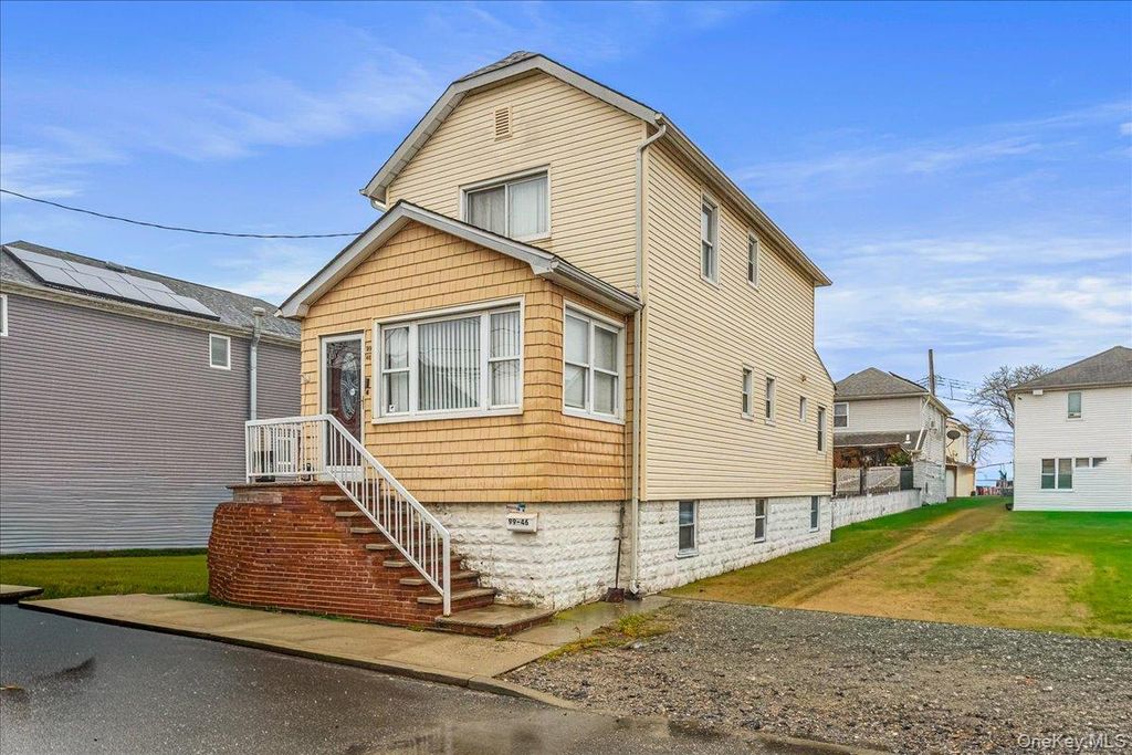 Photo of 99-46 163rd Drive, Howard Beach, NY 11414 (MLS # 941494)
