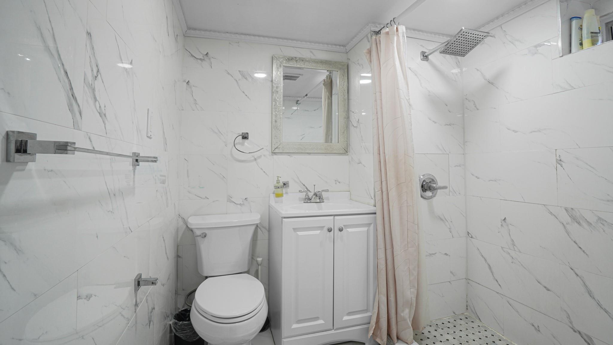 74 Locustwood Boulevard, Elmont, New York image 25