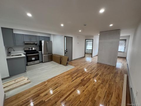 Photo of 104-60 48th Avenue Ave, Corona, NY 11368 (MLS # 961336)
