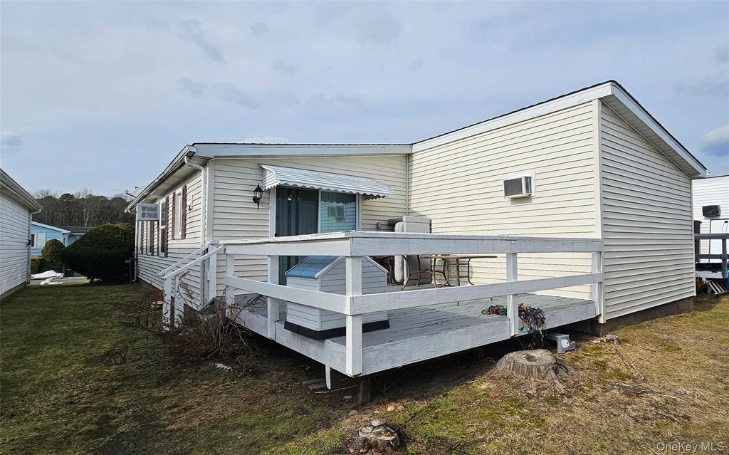 Photo of 54 Dogwood Lane, Manorville, NY 11949 (MLS # 954790)