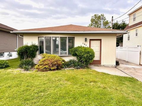 Photo of 163 Vanderbilt Avenue, Island Park, NY 11558 (MLS # 894691)