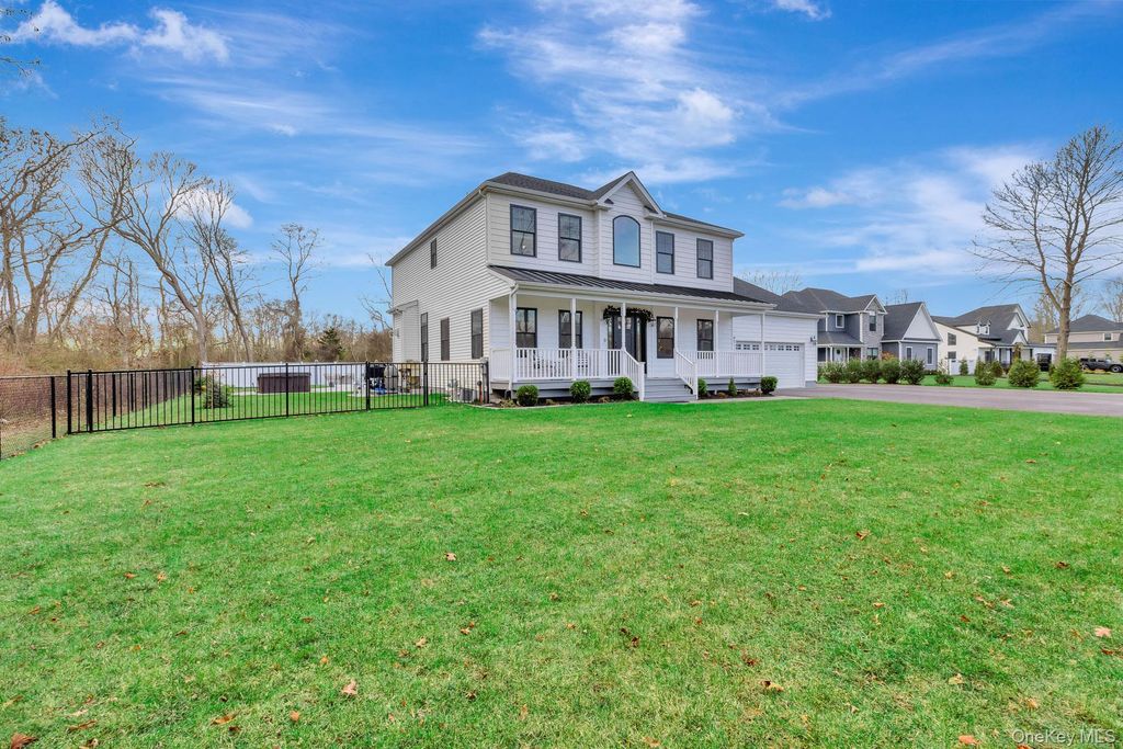 Photo of 15 Shaw Lane, East Moriches, NY 11940 (MLS # 943067)