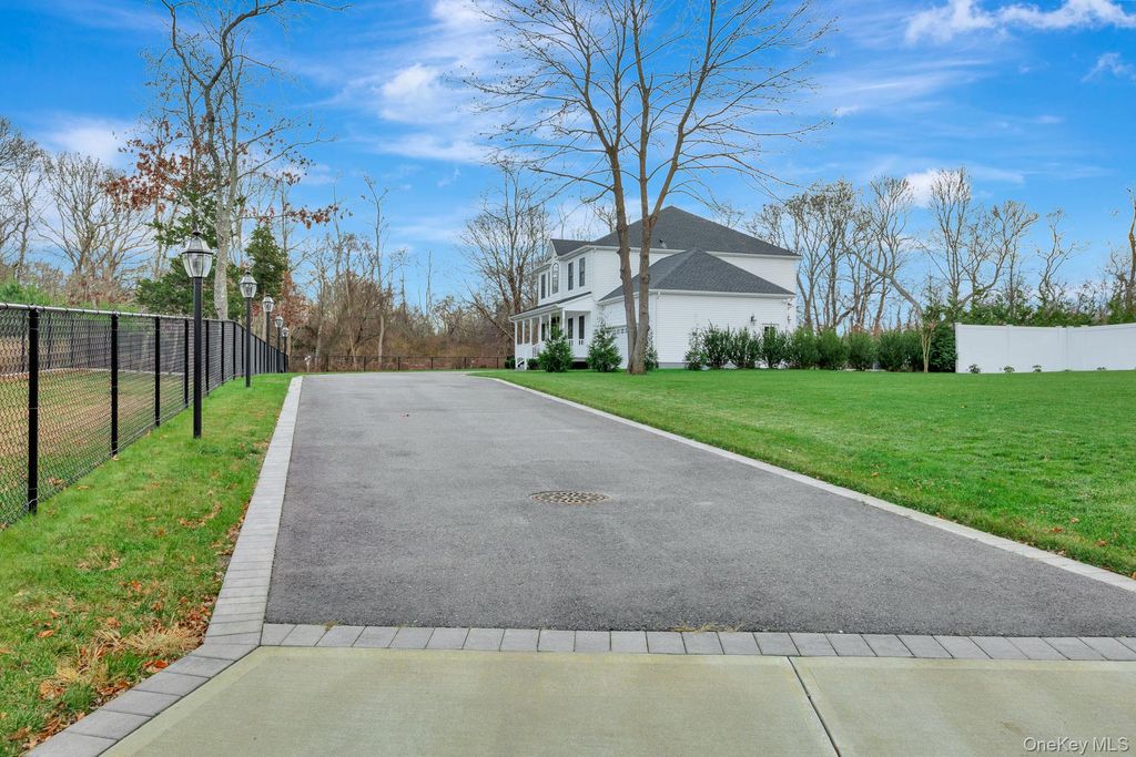 Photo of 15 Shaw Lane, East Moriches, NY 11940 (MLS # 943067)