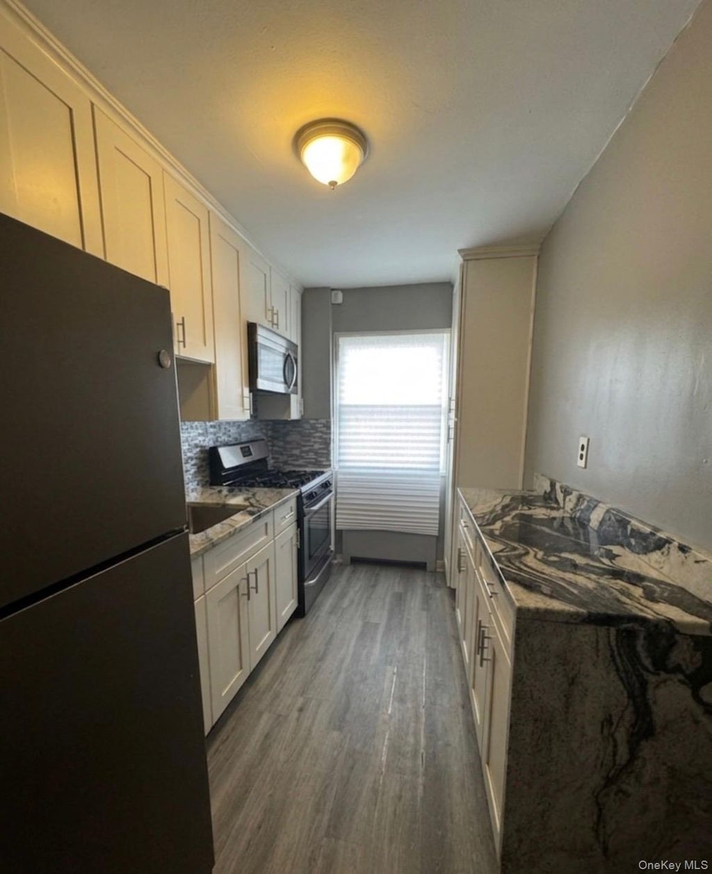 Photo of 88-03 Shore Parkway #3, Howard Beach, NY 11414 (MLS # 974529)