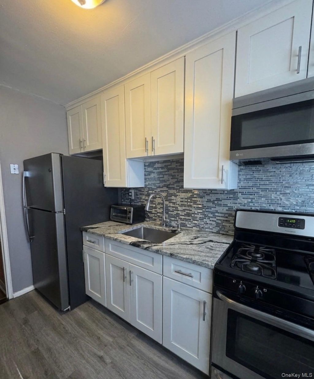 Photo of 88-03 Shore Parkway #3, Howard Beach, NY 11414 (MLS # 974529)