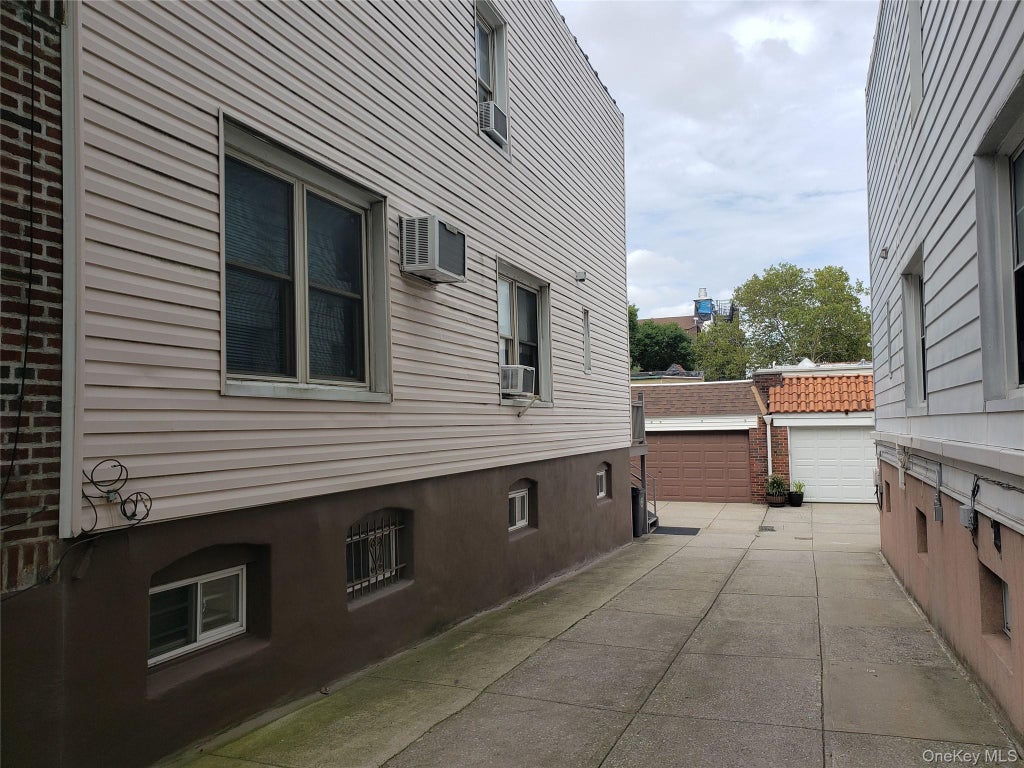 Photo of 8737 Union Turnpike, Glendale, NY 11385 (MLS # 1045250)