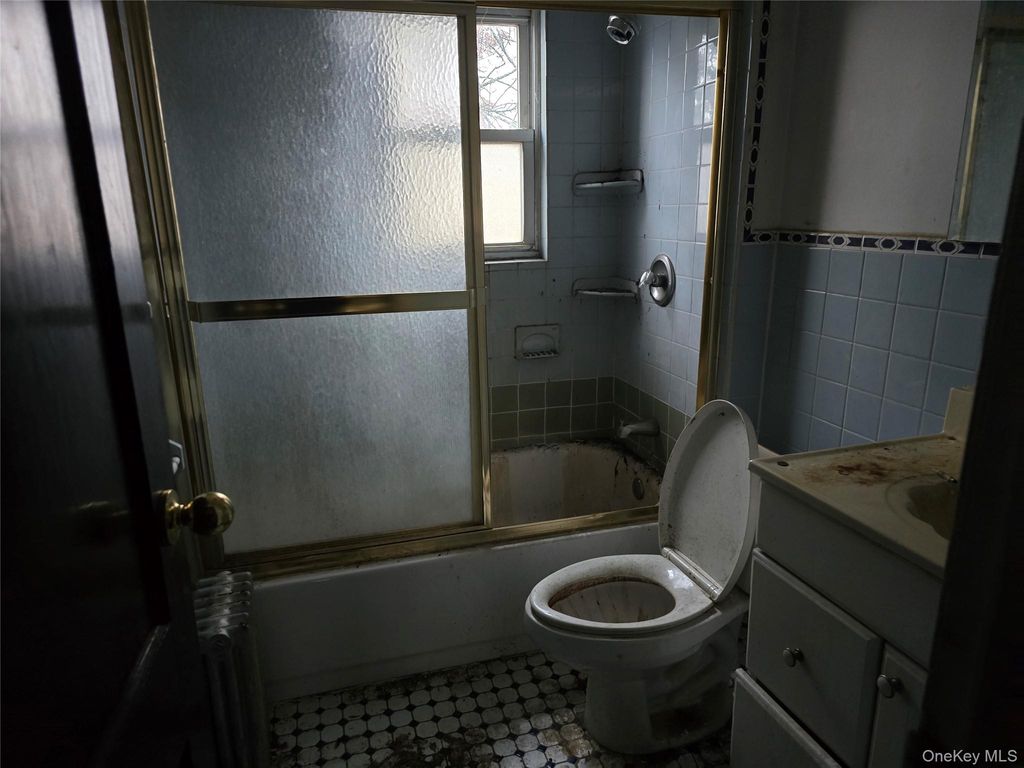 Photo of 90 53 Francis Lewis Blvd Blvd, Hollis, NY 11434 (MLS # 946815)