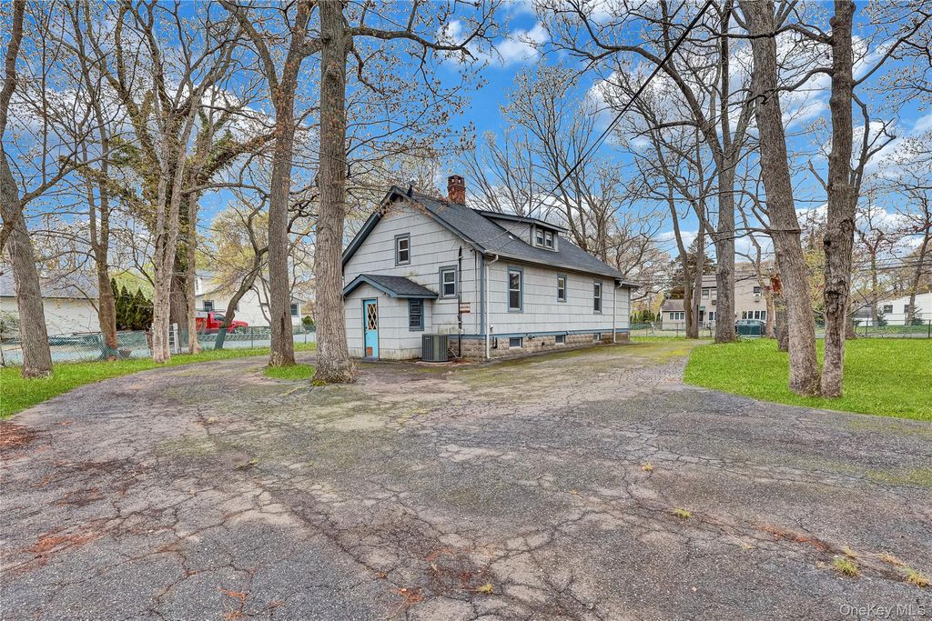 Photo of 25 N Washington Avenue, Centereach, NY 11720 (MLS # 988708)