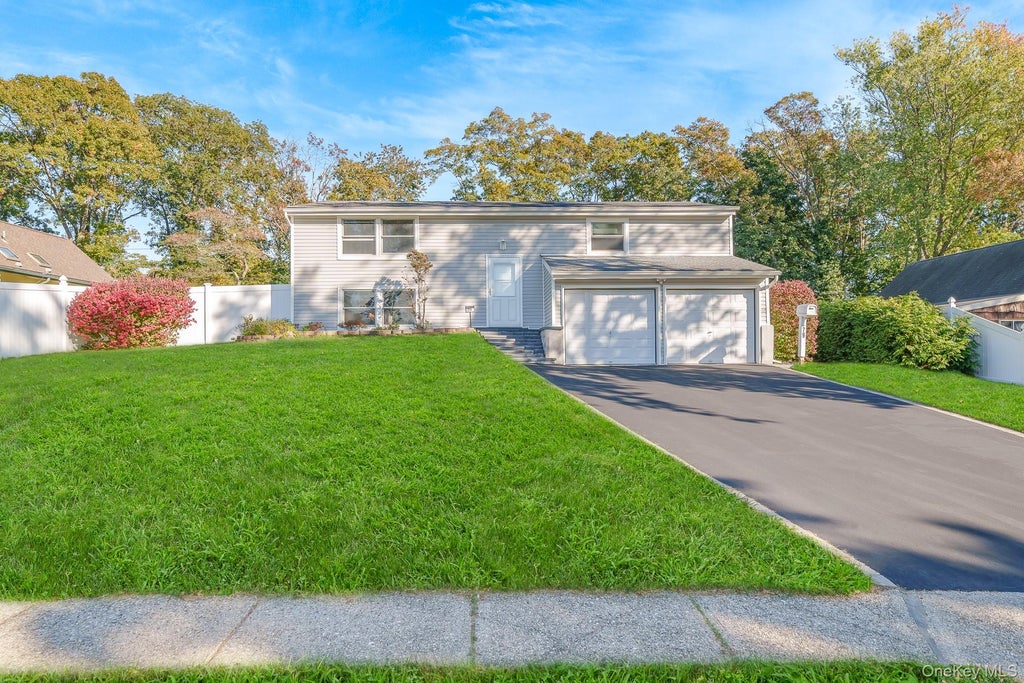 Photo of 79 Snowberry Lane, Islandia, NY 11749 (MLS # 1068027)