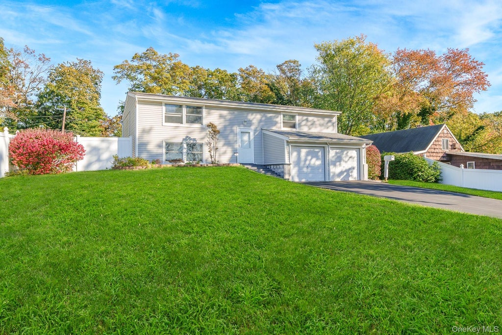 Photo of 79 Snowberry Lane, Islandia, NY 11749 (MLS # 1068027)