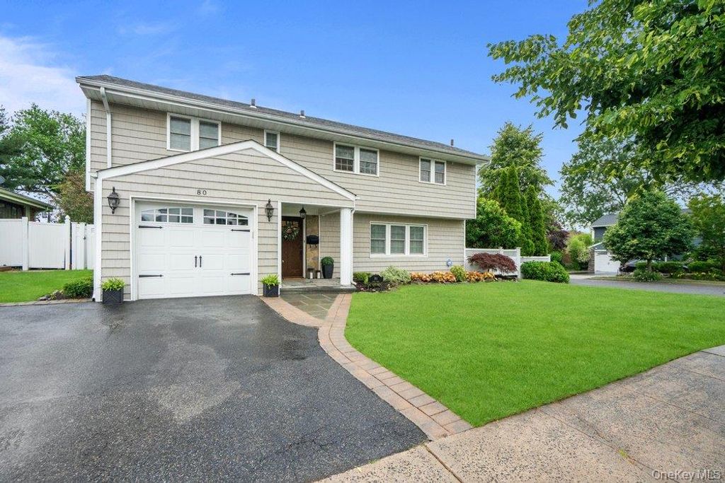 Photo of 80 Joyce Road, Plainview, NY 11803 (MLS # 1017800)