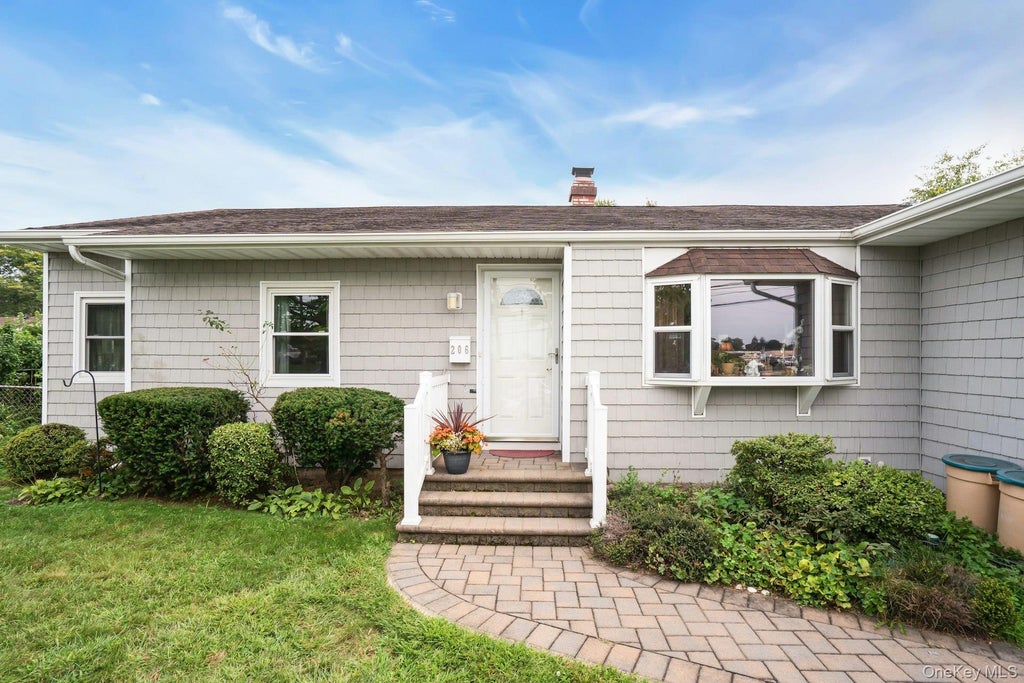 Photo of 206 Alkier Street, Brentwood, NY 11717 (MLS # 1050033)