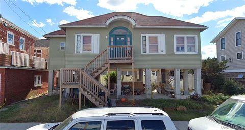 Photo of 608 W Walnut Street, Long Beach, NY 11561 (MLS # 929970)