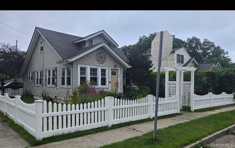 Photo of 61 Highland Avenue, Patchogue, NY 11772 (MLS # 1024811)