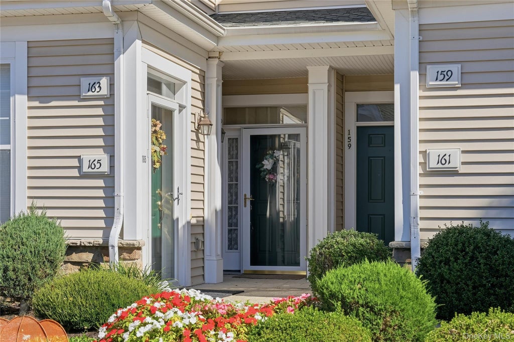 Photo of 163 Symphony Drive, Lake Grove, NY 11755 (MLS # 1057095)