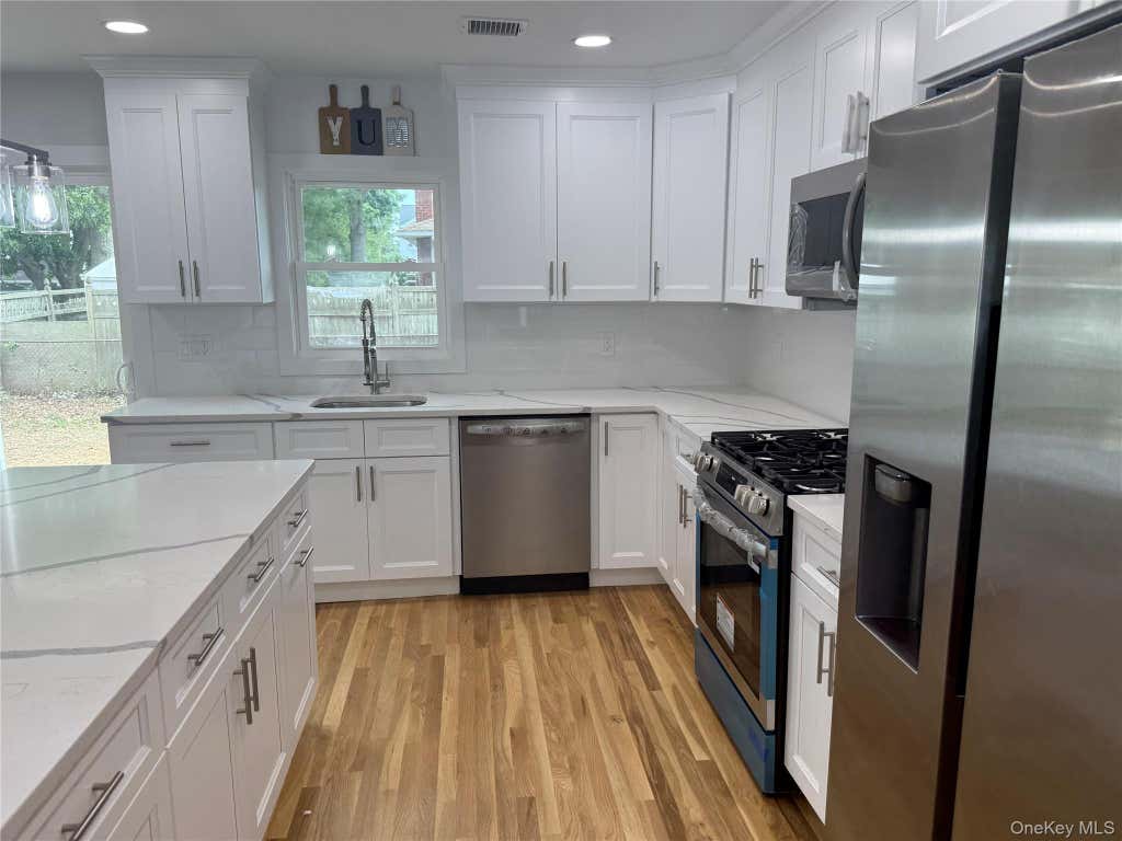 Photo of 2 5th Avenue, Farmingdale, NY 11735 (MLS # 1030798)