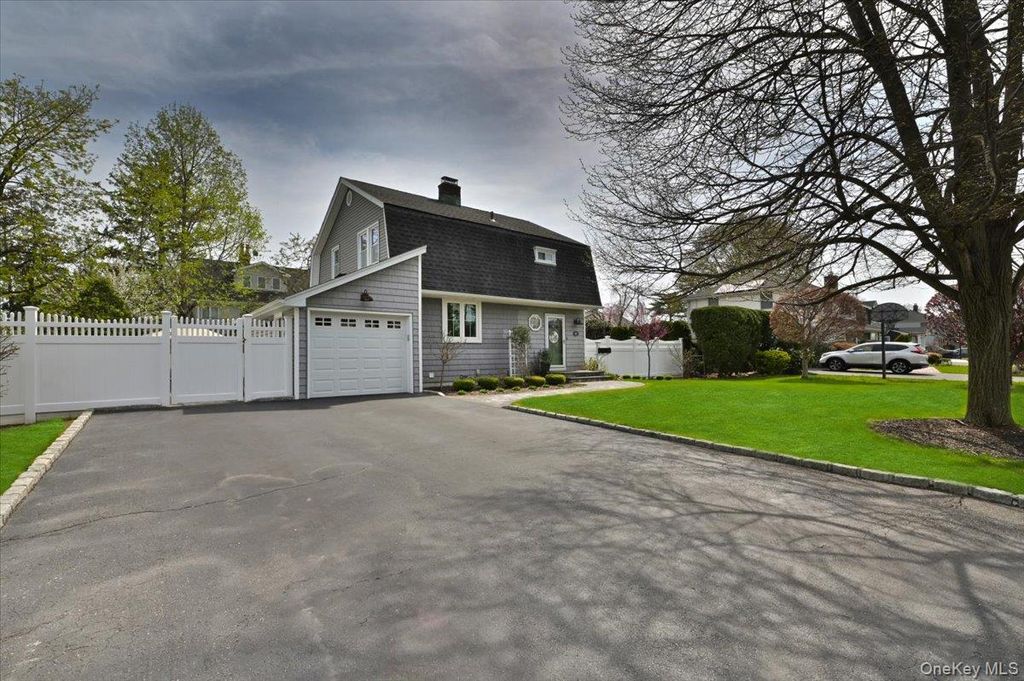 Photo of 88 Webster Street, Westbury, NY 11590 (MLS # 987665)