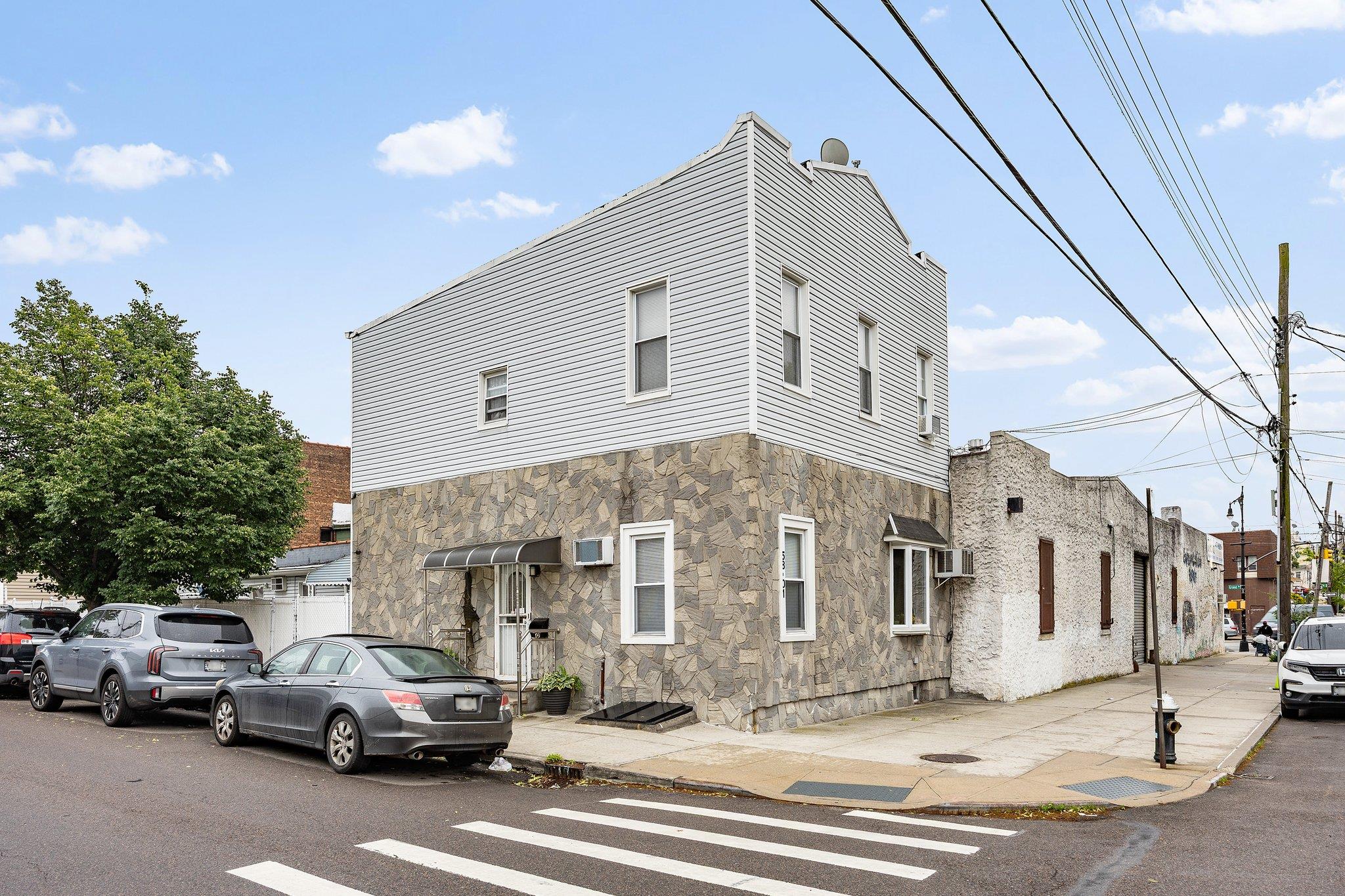 59th Street, Maspeth, Queens, NY - 4 Bedrooms  
2 Bathrooms  
7 Rooms - 