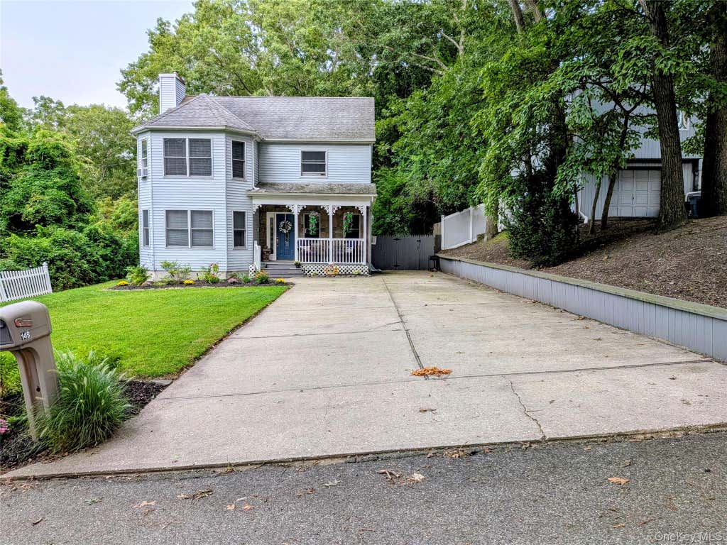Photo of 149 Grassy Pond Drive S, Smithtown, NY 11787 (MLS # 1036970)