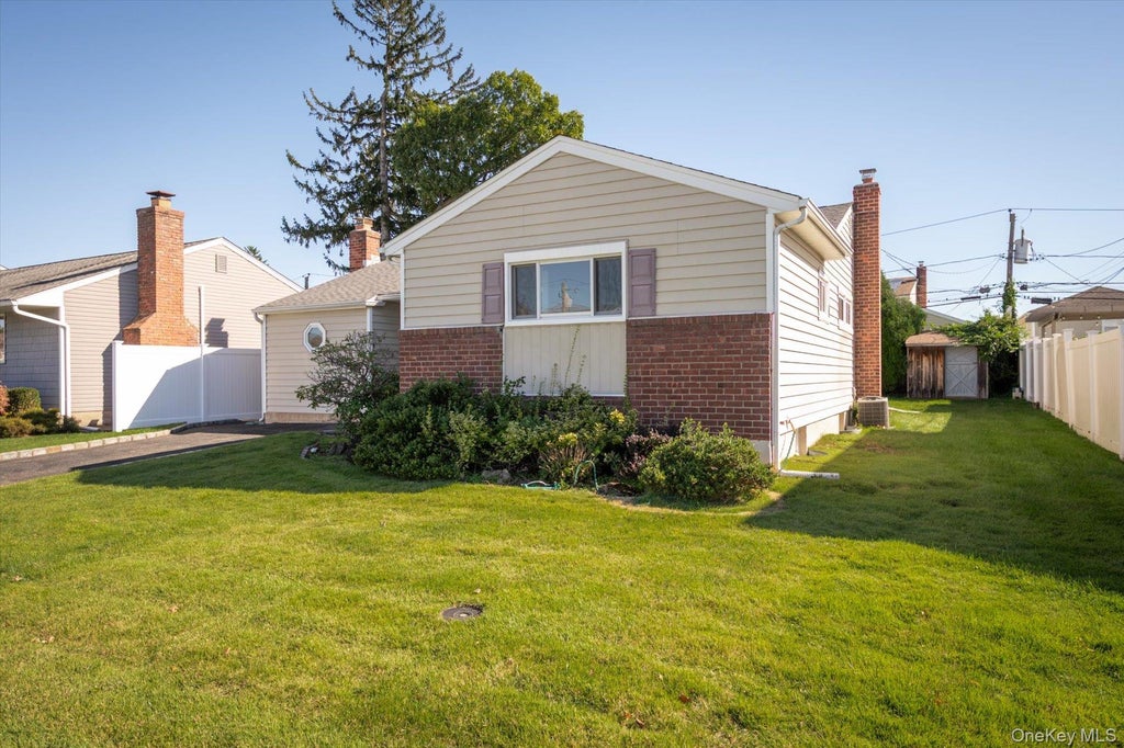 Photo of 46 Hunter Lane, Hicksville, NY 11801 (MLS # 1056081)