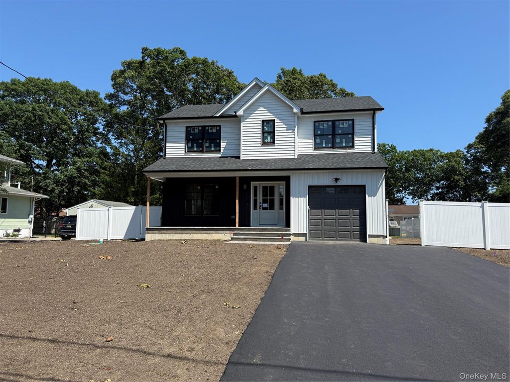 Photo of 39 Surrey Drive, Center Moriches, NY 11934 (MLS # 1023740)