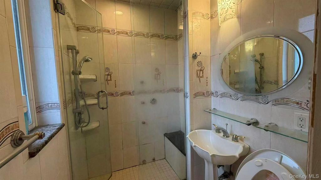 Photo of 100-01 75TH Avenue, Forest Hills, NY 11375 (MLS # 960688)