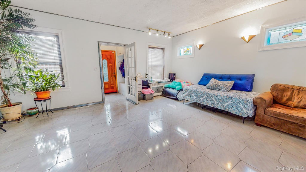 Photo of 64-53 82nd Place, Middle Village, NY 11379 (MLS # 1048228)