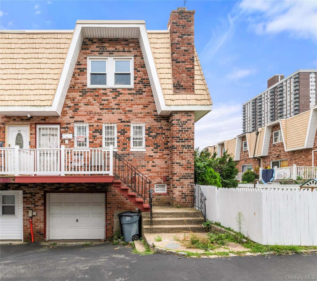 Photo of 211 Beach 16th Street, Far Rockaway, NY 11691 (MLS # 1040436)