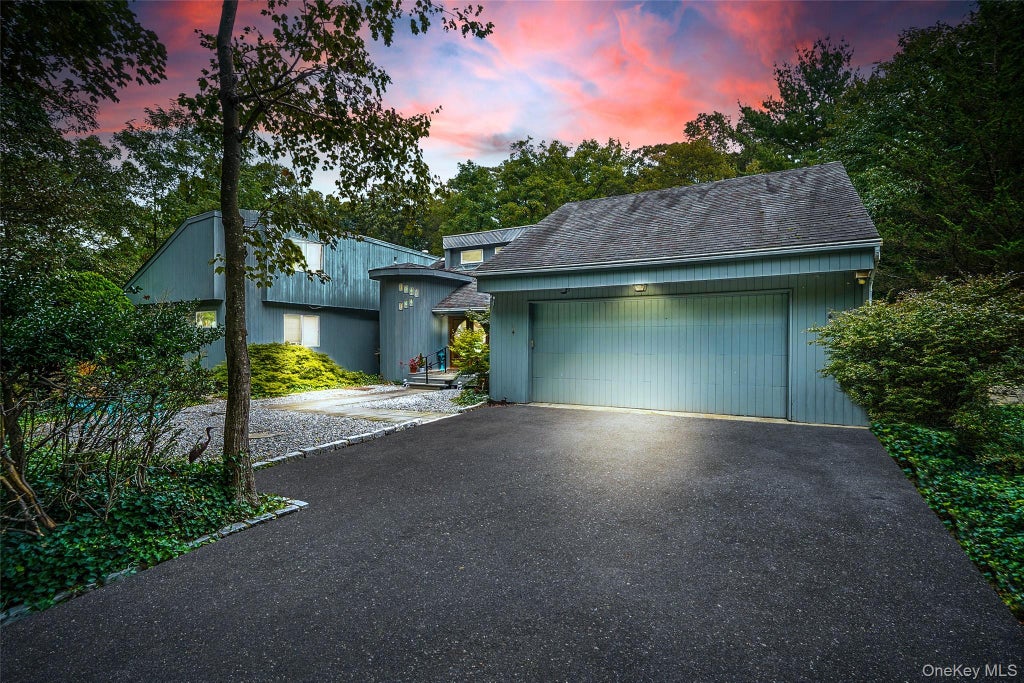 Photo of 271 Bread and Cheese Hollow Road, Northport, NY 11768 (MLS # 1063597)