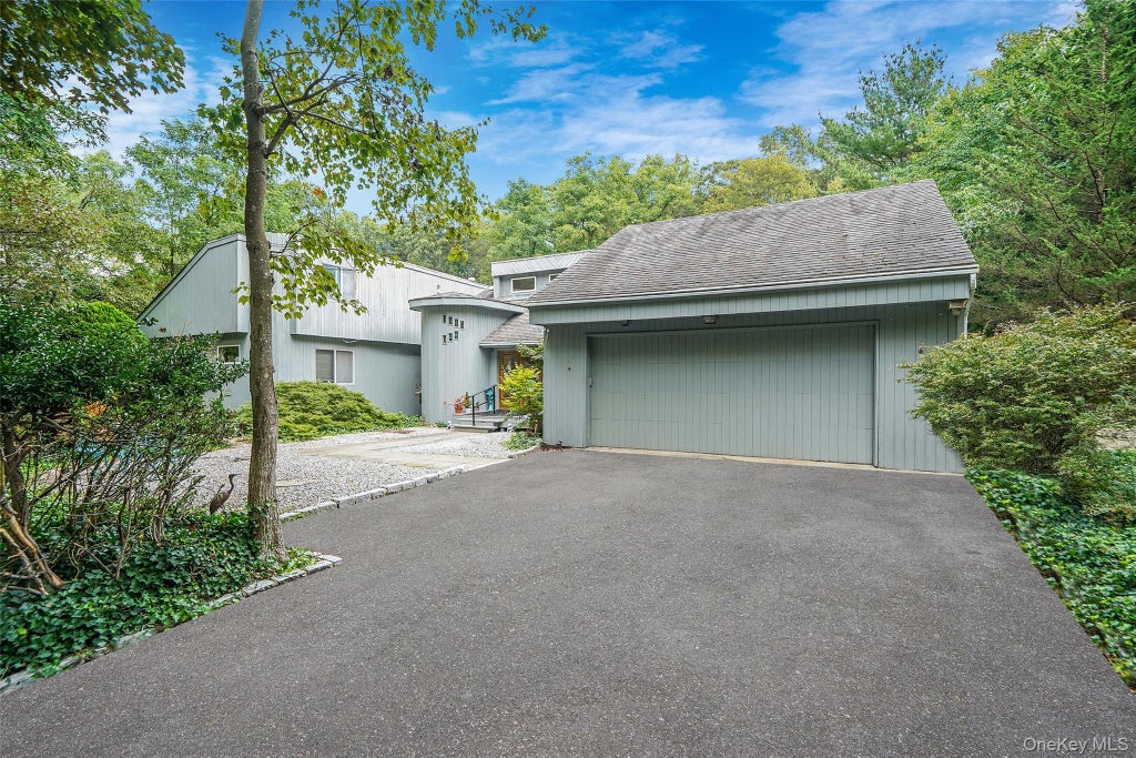 Photo of 271 Bread and Cheese Hollow Road, Northport, NY 11768 (MLS # 1063597)